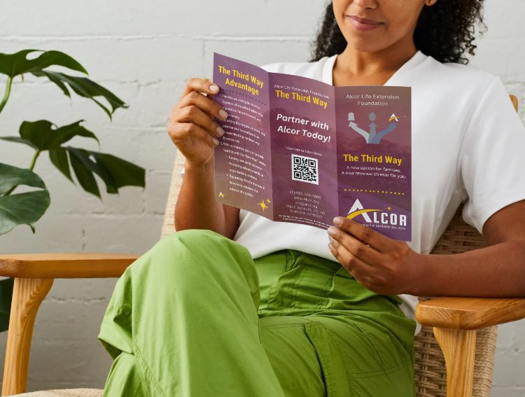 Woman reading The Third Way brochure